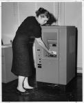 (12456) AFSCME staff operate automatic accounting system, 1958.