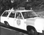(29084) Carl Gentile Sits in Police Car During Strike