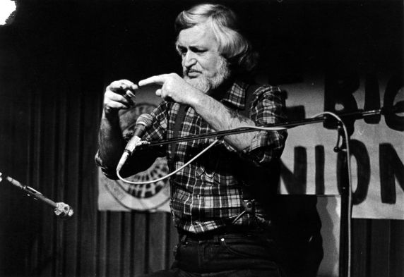 (32382) Utah Phillips Pointing His Fingers Together During a Performance, Washington, circa 1980