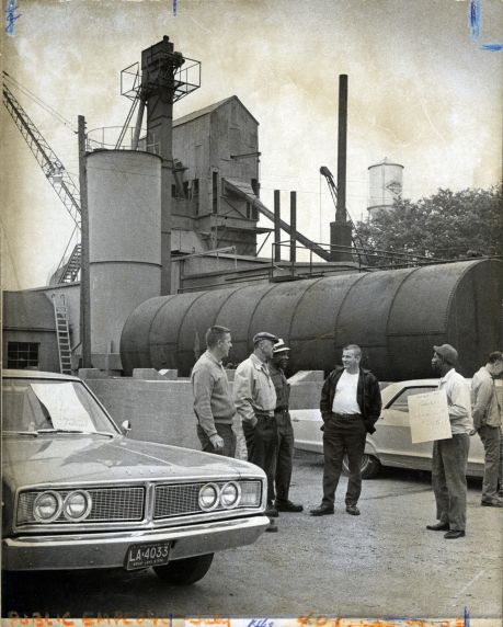 (4025) Men picket asphalt plant during strike, Lansing, Michigan, 1968