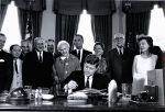 (46019) JFK signs bill