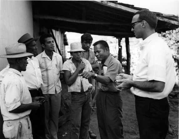 (7445) Larry Itliong and Dick Ginnold speak with Brazilian farm workers