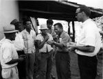 (7446) Larry Itliong and Dick Ginnold speak with Brazilian farm workers