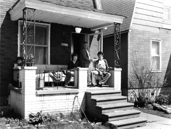 (WSAV002727_101) Residents on porch, 2281 Adele Street, 1981